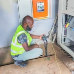 Power upgrade project. Engineer carrying earth tests to ensure new power system is meeting safety requirements.