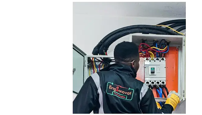 Enginnovat technician installing main power breaker for a client