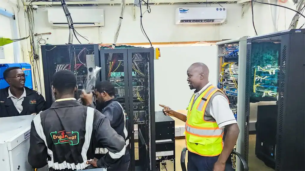 Enginnovat technicians installing equipment in a dedicated server room.