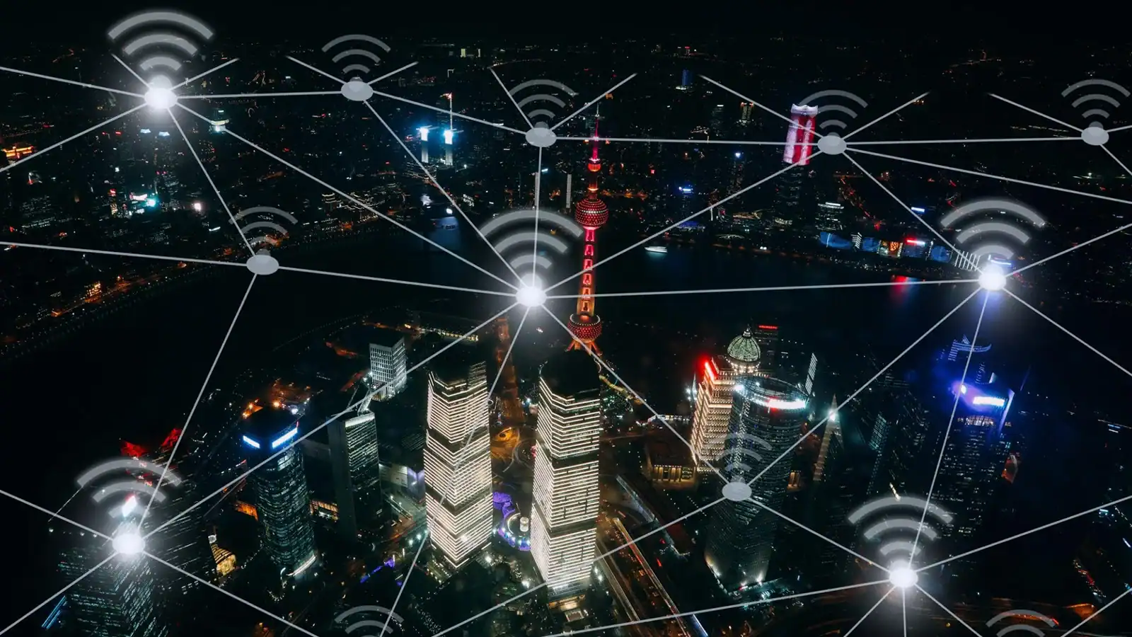 Network and wireless connectivity across a city showing interconnected systems and high-performance communication links.