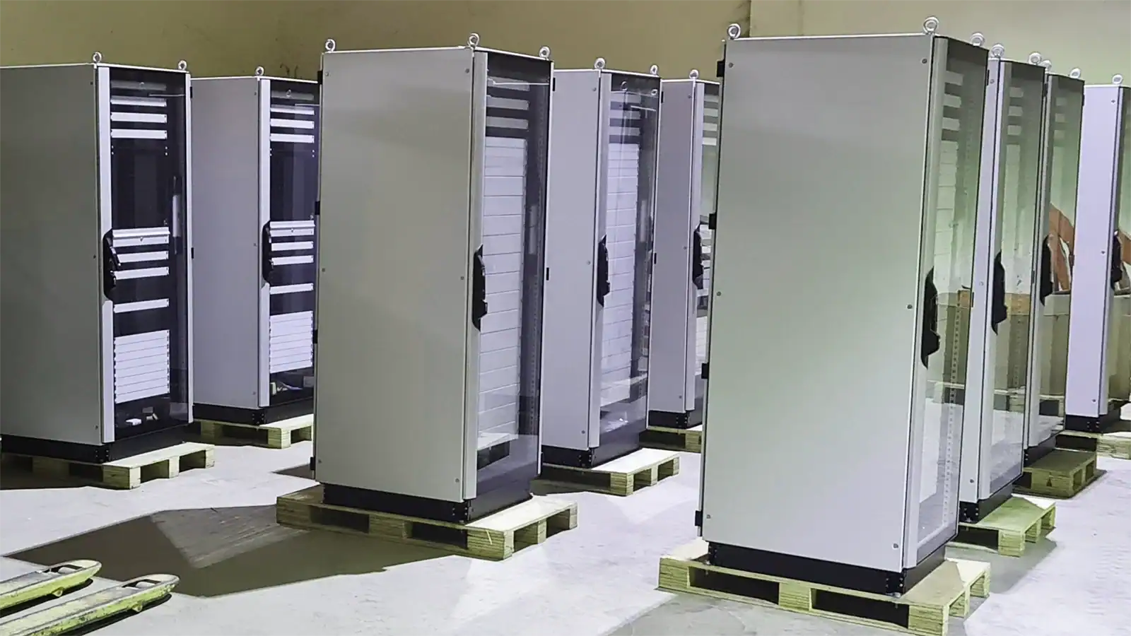 New server racks delivered to workshop and prepared for equipment assembly and installation.