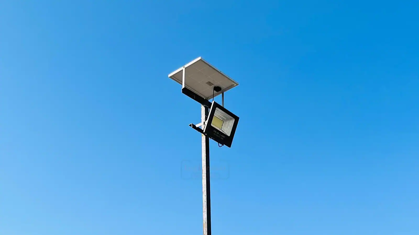 Solar flood light with integrated solar panel providing off-grid lighting for outdoor and remote locations.