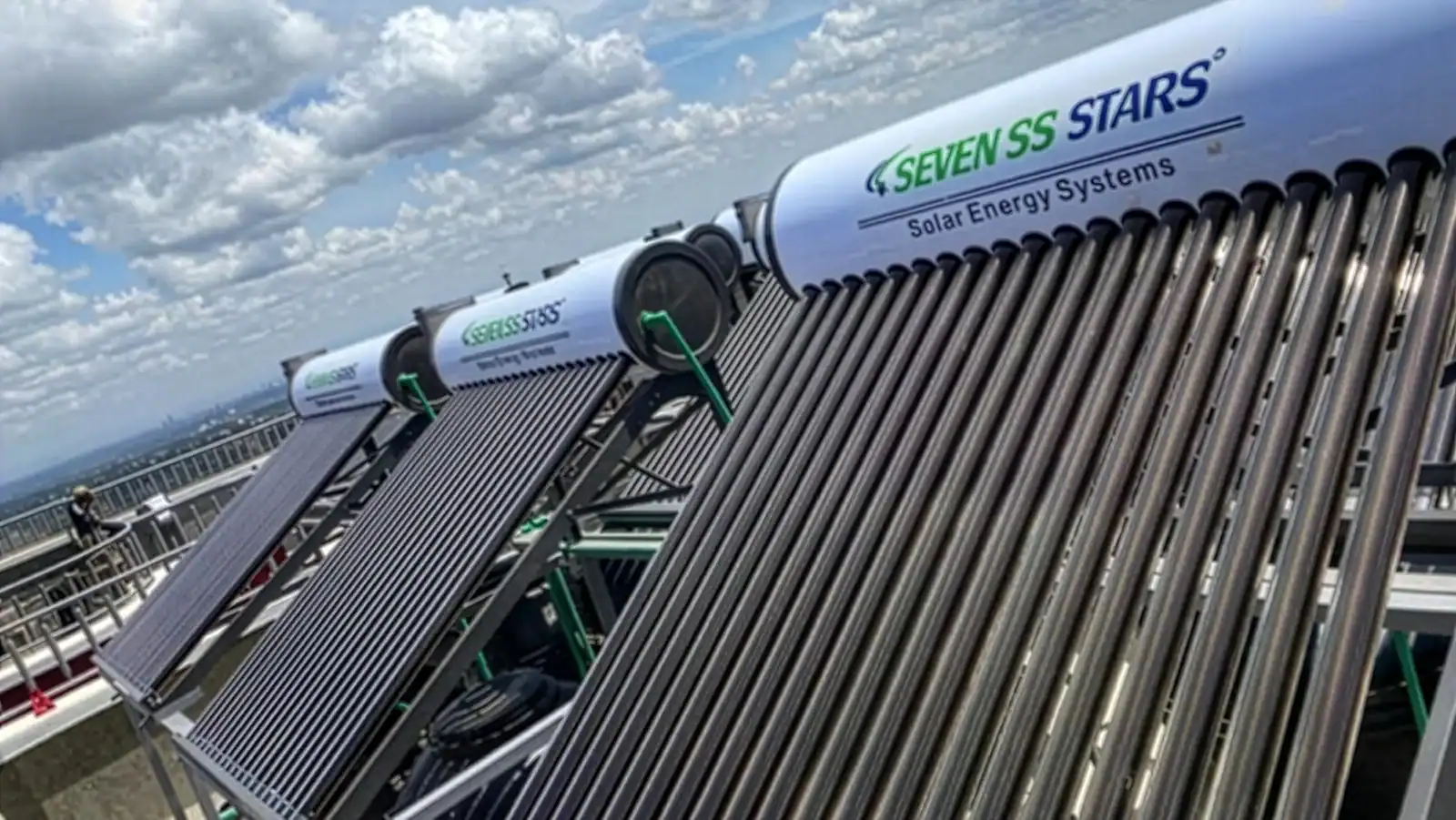 Commercial evacuated tube solar water heating system installed on a rooftop for efficient hot water generation
