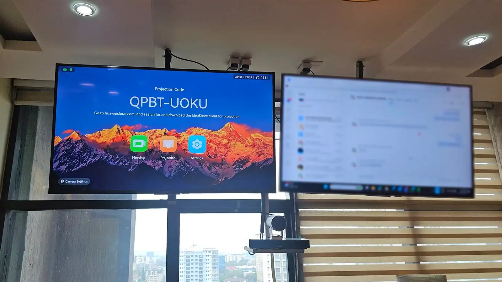 Huawei CloudLink Bar 310 video conferencing system with dual display setup installed in client meeting room.