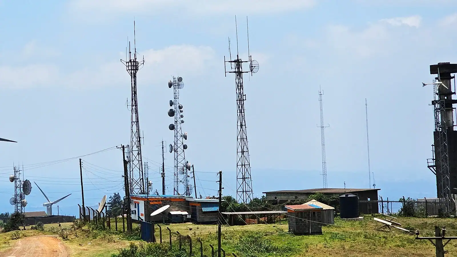 Telecommunication towers supporting wireless network transmission, microwave backhaul, and cellular communication infrastructure.