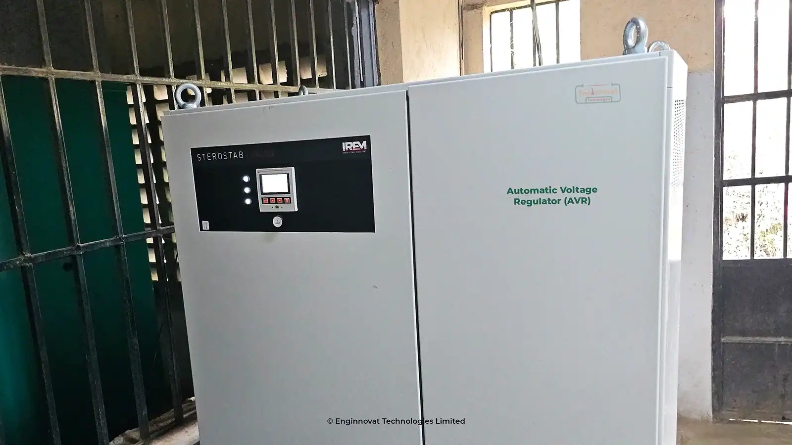 A heavy-duty IREM 410 kVA Automatic Voltage Regulator installed by Enginnovat Technologies for university power stabilization.